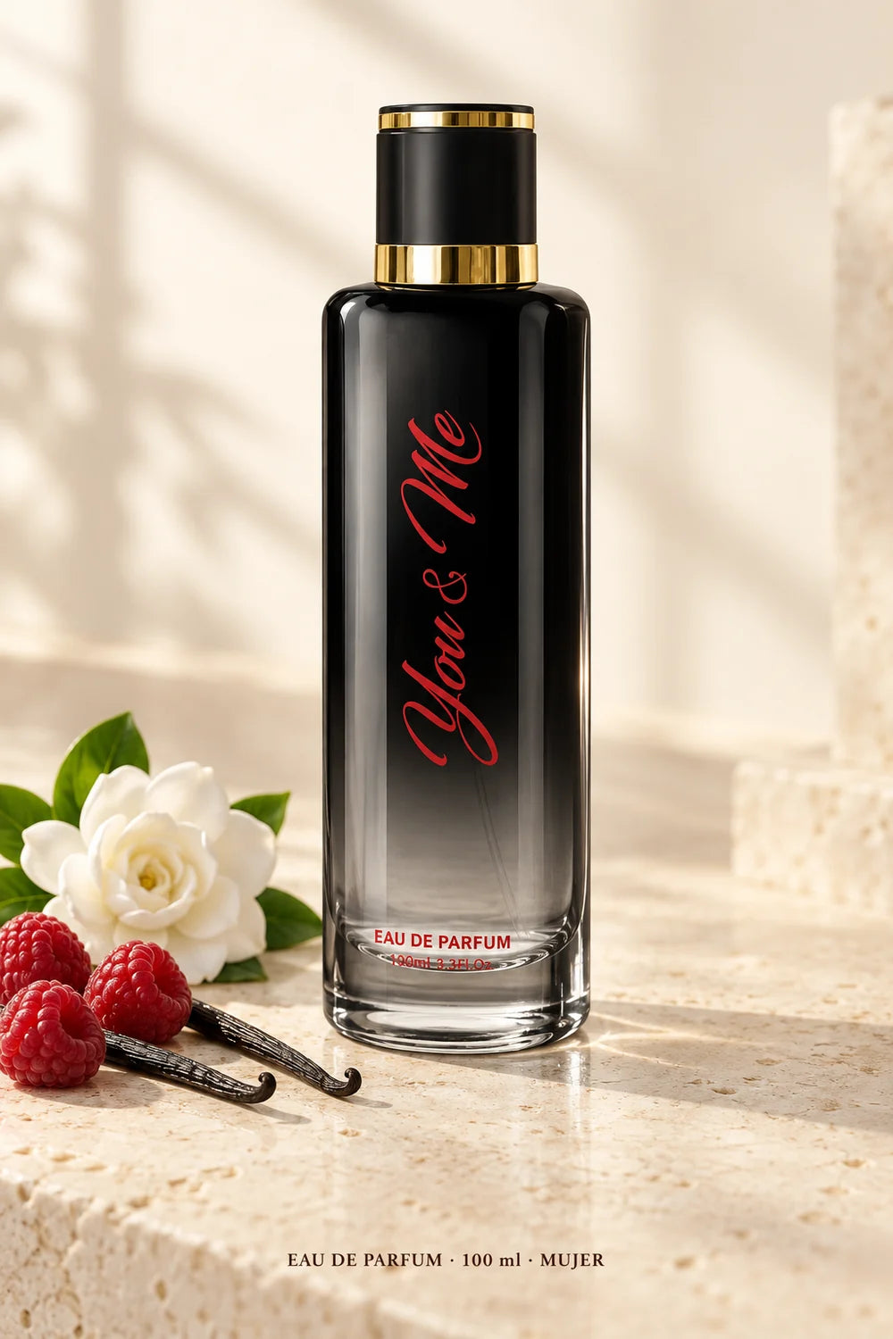 You & Me Eau de Parfum de 100 ml para mujer, frasco negro con reflejos laterales sobre fondo claro con frambuesa, gardenia y vainilla.