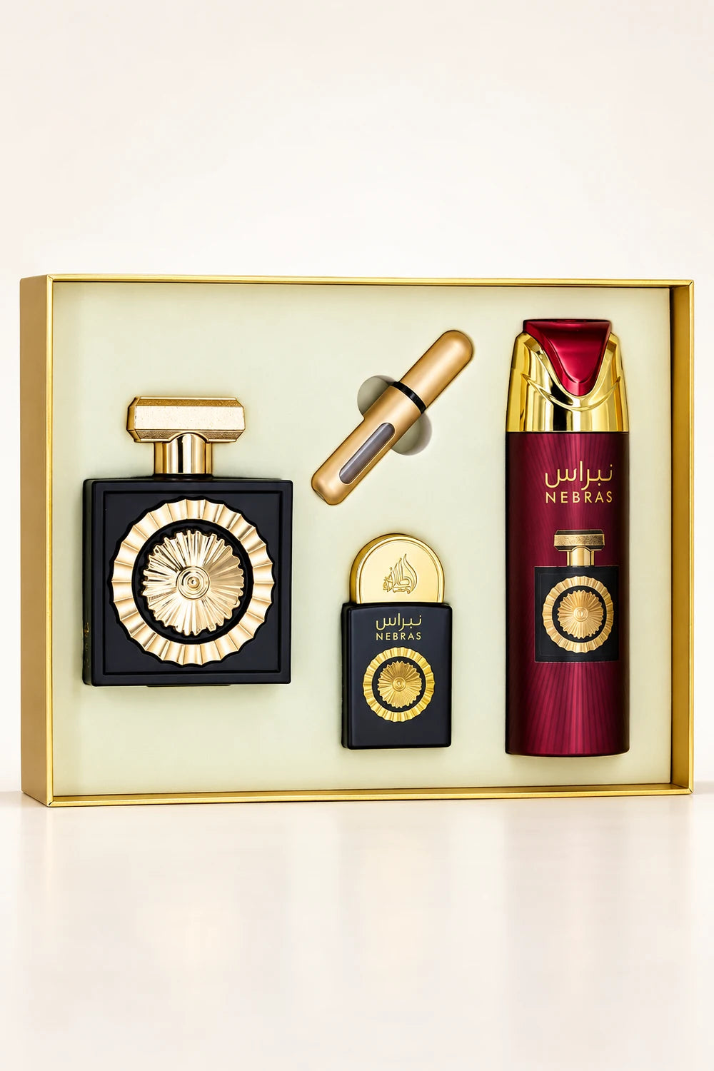 Estuche Nebras de Lattafa Pride abierto, con el frasco de 100 ml, mini de 20 ml, spray perfumado de 200 ml y atomizador.